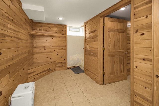 1449 Laurel Ave, Saint Paul, MN 55104 - bathroom with tile patterned flooring and wood walls