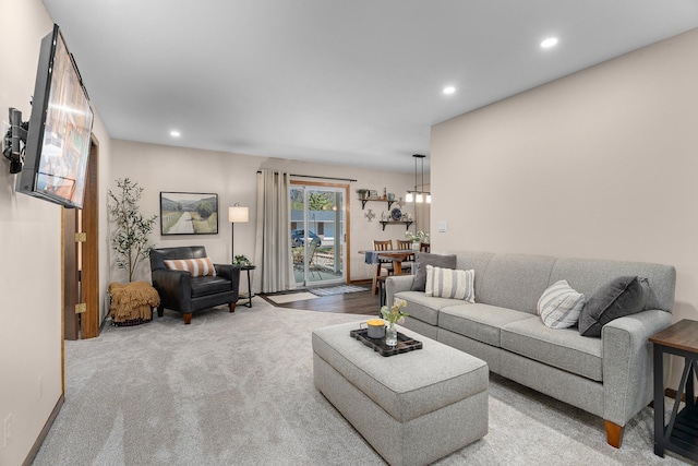 living room with carpet flooring and recessed lighting
