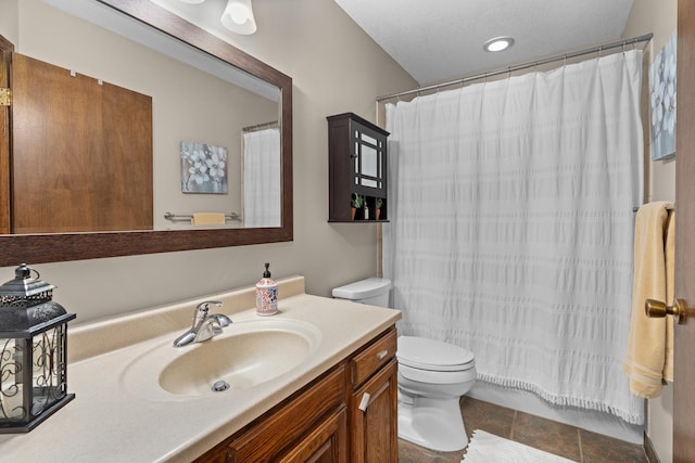 bathroom with toilet, a shower with curtain, tile patterned flooring, and vanity