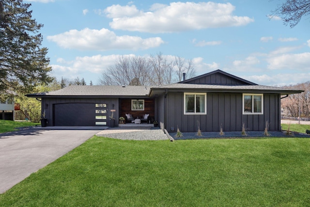 17725 26th Ave N, Plymouth, MN 55447 - ranch-style home featuring a garage, board and batten siding, concrete driveway, and a front lawn