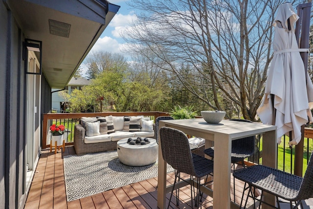 17725 26th Ave N, Plymouth, MN 55447 - deck with outdoor dining area and an outdoor living space