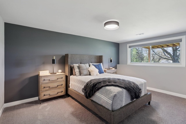 17725 26th Ave N, Plymouth, MN 55447 - bedroom featuring baseboards, visible vents, and light carpet