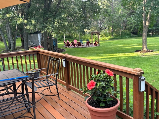 14898 Lynndale Ln, Baxter, MN 56425 - wooden deck with a lawn and view of scattered trees