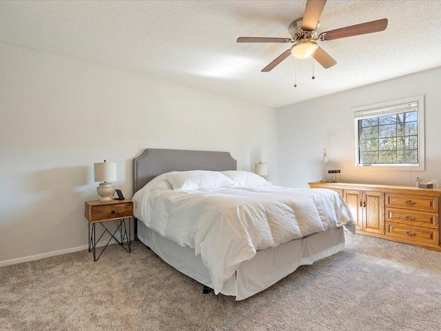 14898 Lynndale Ln, Baxter, MN 56425 - bedroom with light colored carpet, a ceiling fan, and a textured ceiling