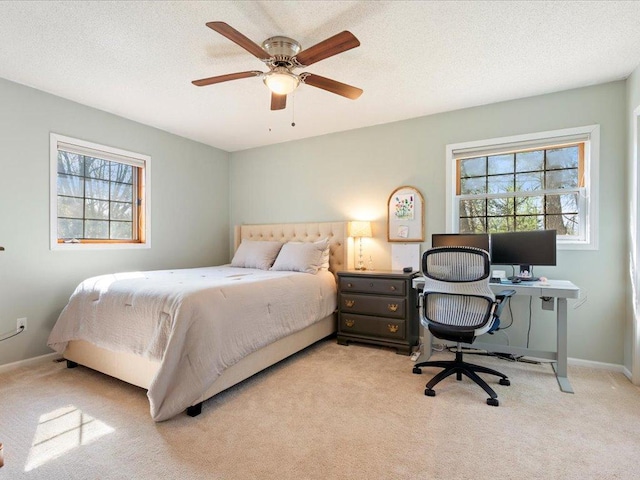 14898 Lynndale Ln, Baxter, MN 56425 - bedroom with multiple windows, light colored carpet, and a desk