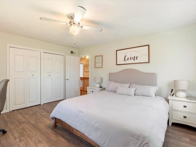 14898 Lynndale Ln, Baxter, MN 56425 - bedroom featuring dark wood-style floors and a ceiling fan