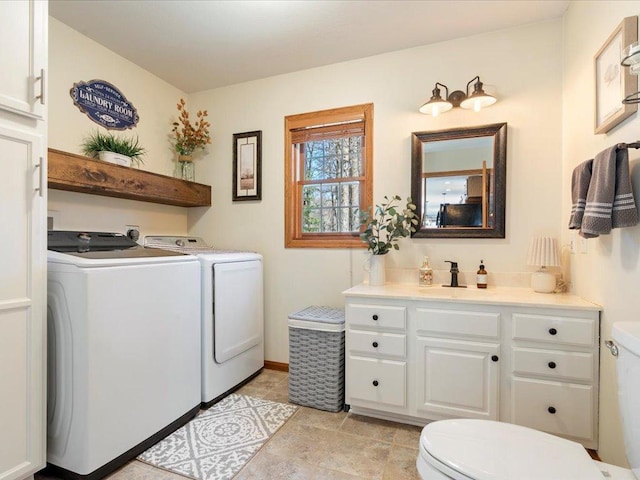 14898 Lynndale Ln, Baxter, MN 56425 - bathroom with toilet, washer and clothes dryer, and vanity