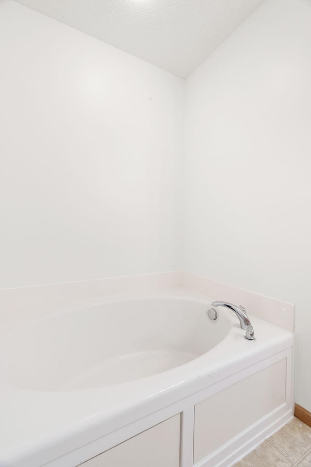 5030 Yuma Ln N, Plymouth, MN 55446 - full bath featuring a garden tub and tile patterned flooring