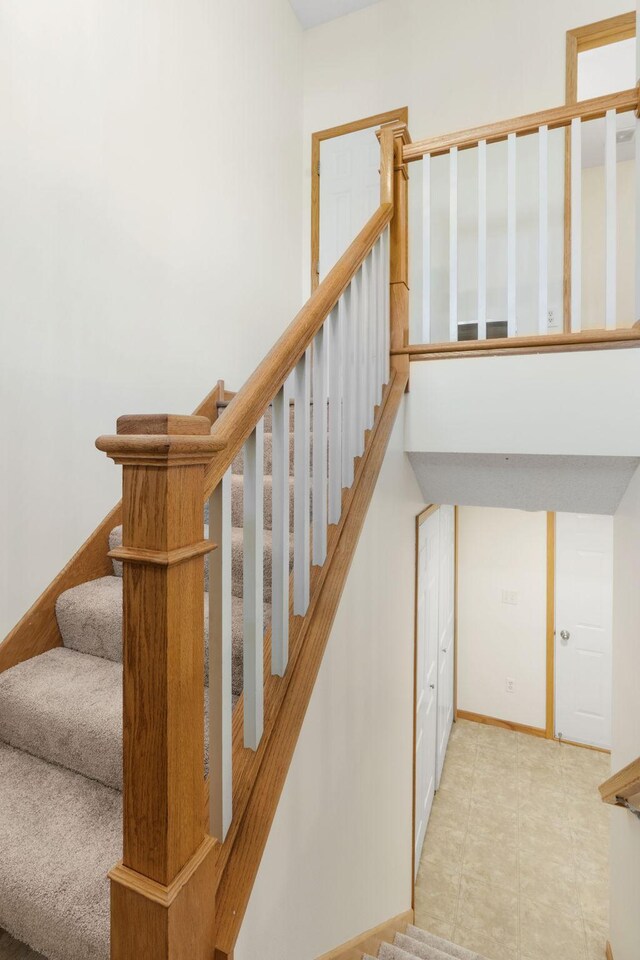 5030 Yuma Ln N, Plymouth, MN 55446 - stairs with tile patterned floors and baseboards