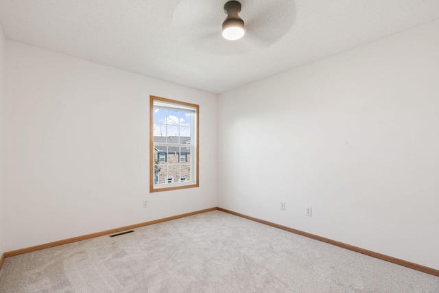 5030 Yuma Ln N, Plymouth, MN 55446 - unfurnished room featuring carpet floors, baseboards, and a ceiling fan