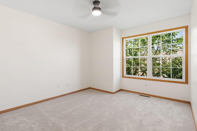 5030 Yuma Ln N, Plymouth, MN 55446 - unfurnished room featuring carpet floors, baseboards, and ceiling fan
