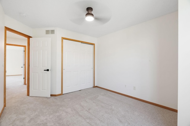 5030 Yuma Ln N, Plymouth, MN 55446 - unfurnished bedroom with light carpet, baseboards, a closet, and ceiling fan
