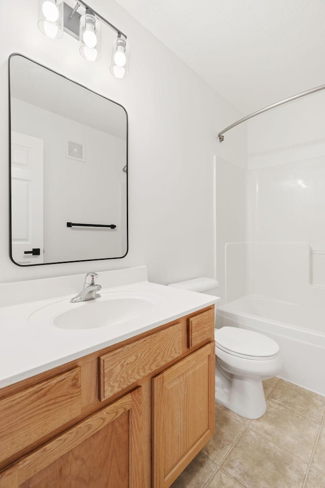 5030 Yuma Ln N, Plymouth, MN 55446 - full bath featuring tile patterned floors, toilet, vanity, and tub / shower combination