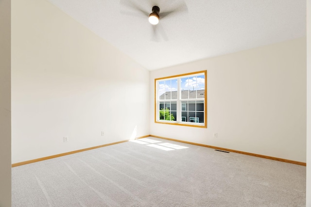 5030 Yuma Ln N, Plymouth, MN 55446 - unfurnished room featuring carpet floors, baseboards, lofted ceiling, and a ceiling fan