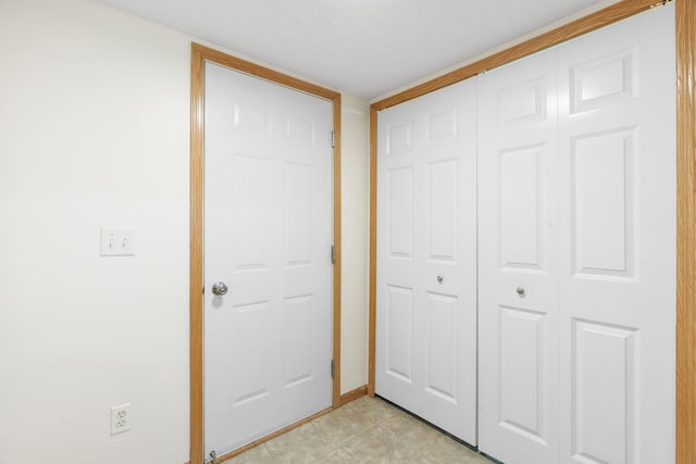 5030 Yuma Ln N, Plymouth, MN 55446 - unfurnished bedroom featuring a closet and baseboards
