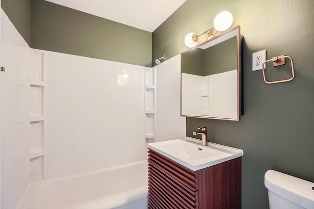 full bathroom featuring vanity, toilet, and shower / tub combination