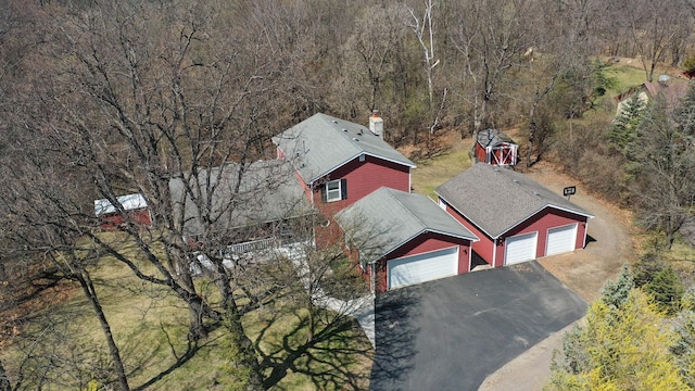 bird's eye view featuring a forest view