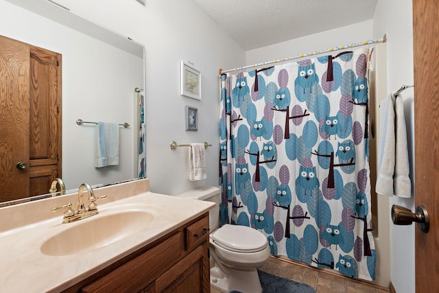 bathroom with vanity, toilet, a textured ceiling, and a shower with shower curtain