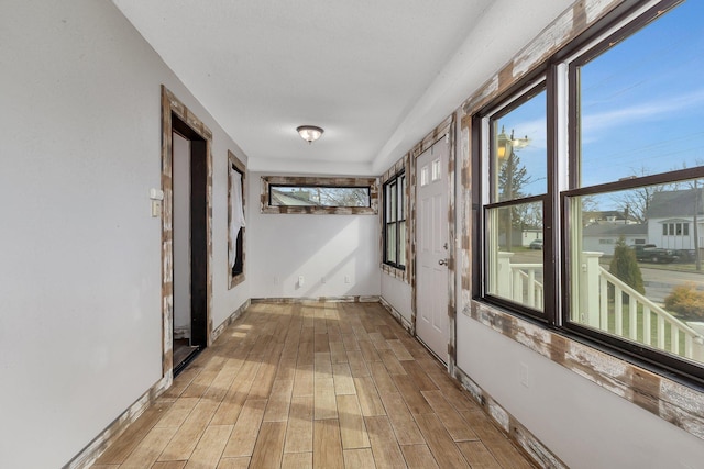 131 Norman Ave N, Foley, MN 56329 - corridor featuring baseboards and light wood-style flooring