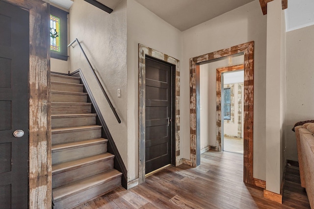 131 Norman Ave N, Foley, MN 56329 - staircase with baseboards and wood finished floors