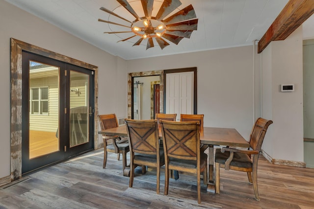 131 Norman Ave N, Foley, MN 56329 - dining room with crown molding, wood finished floors, and visible vents