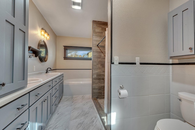 131 Norman Ave N, Foley, MN 56329 - bathroom with double vanity, a bath, a sink, toilet, and tiled shower