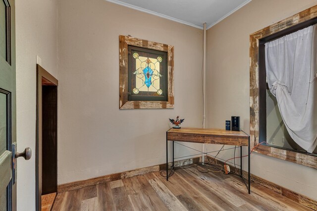 131 Norman Ave N, Foley, MN 56329 - interior space with crown molding, baseboards, and wood finished floors