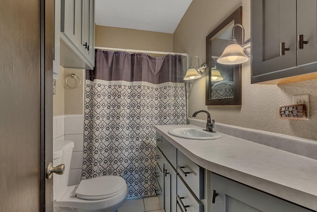 131 Norman Ave N, Foley, MN 56329 - full bathroom featuring tile walls, tile patterned floors, vanity, toilet, and a shower with shower curtain