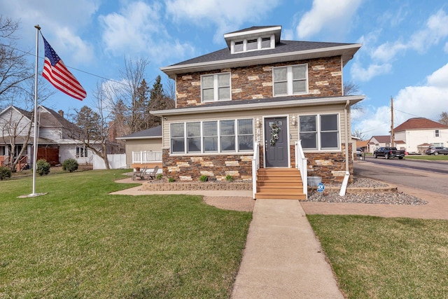 131 Norman Ave N, Foley, MN 56329 - american foursquare style home featuring entry steps, fence, stone siding, and a front lawn