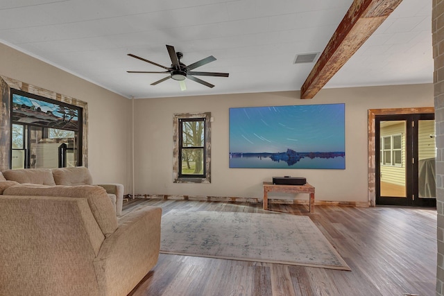 131 Norman Ave N, Foley, MN 56329 - living area featuring a ceiling fan, baseboards, visible vents, and wood finished floors