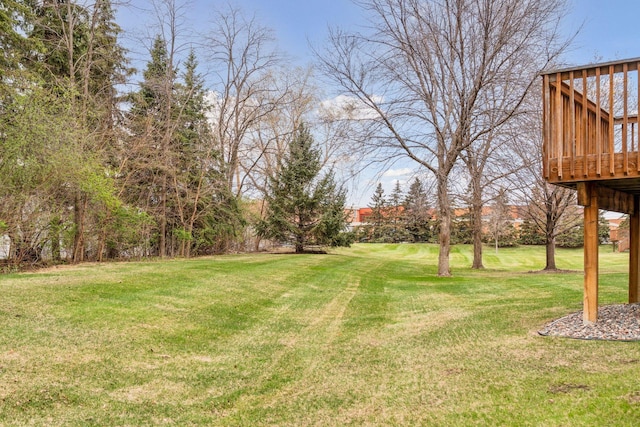 view of yard featuring a deck
