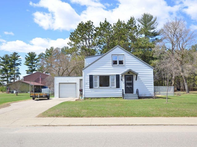 bungalow with fence, an attached garage, driveway, and a front yard