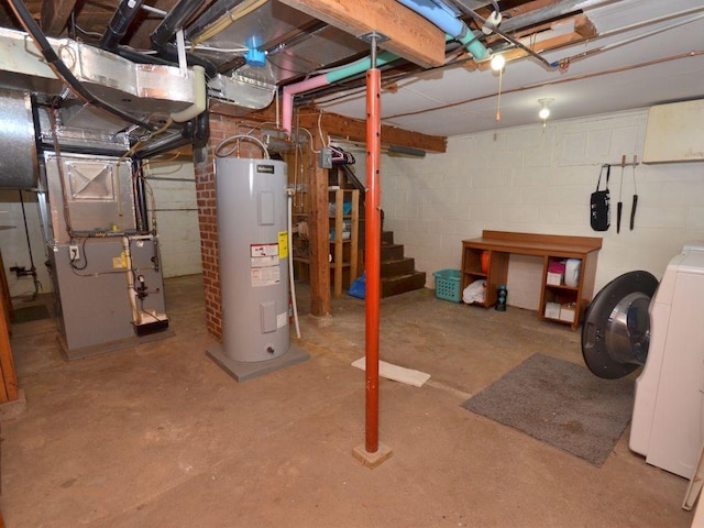 unfinished below grade area featuring concrete block wall, water heater, stairs, washer / clothes dryer, and heating unit