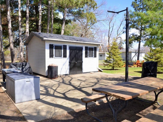 view of outbuilding featuring an outdoor structure