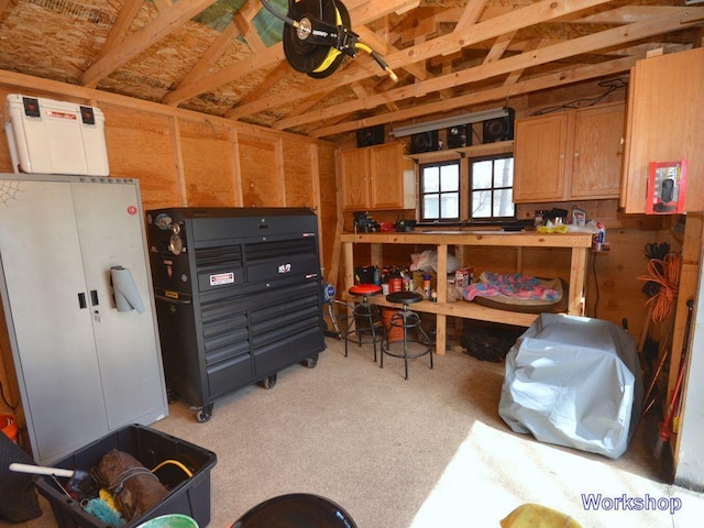 garage with a workshop area
