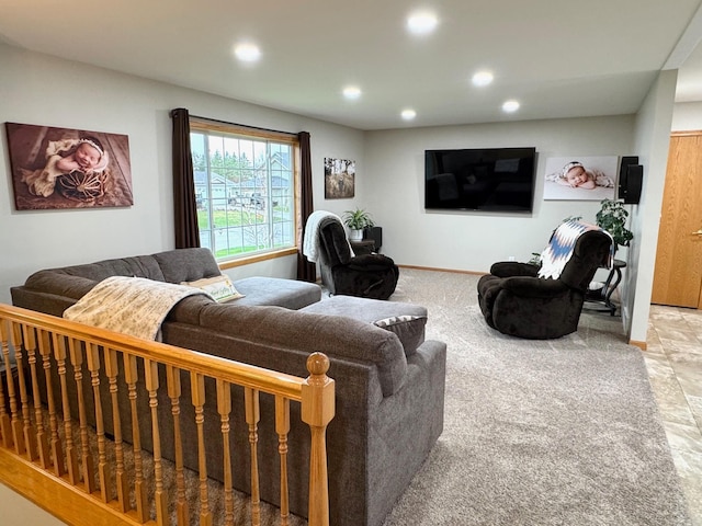living area with recessed lighting and baseboards