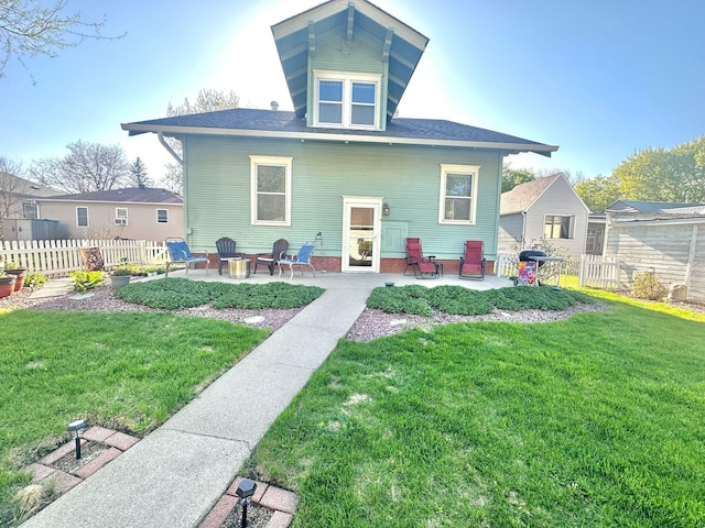 rear view of house featuring a patio