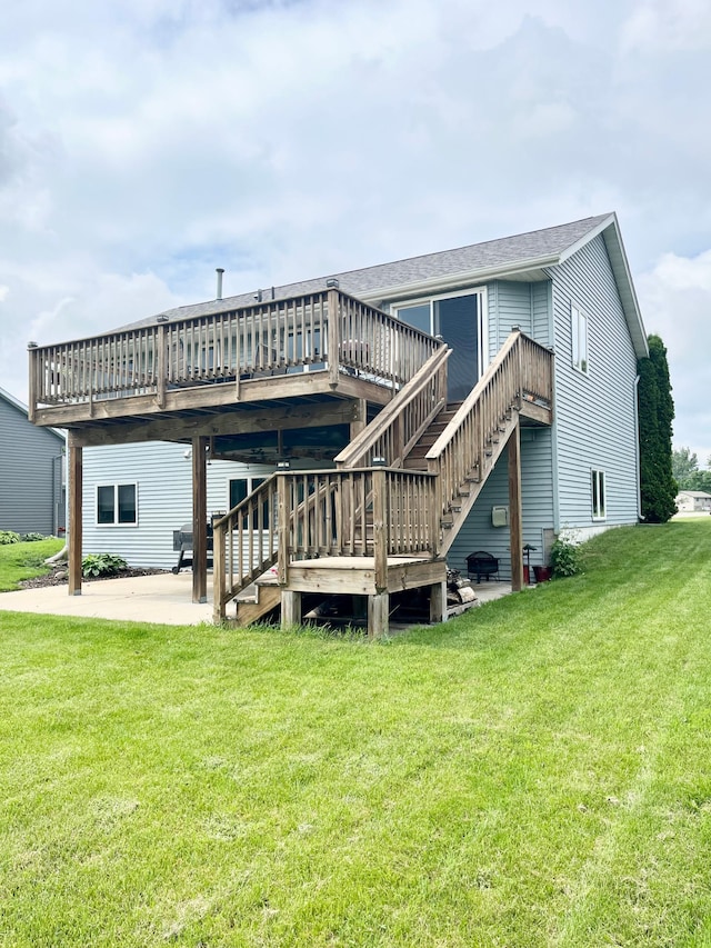 816 3rd St S, Sartell, MN 56377 - back of property with a patio, stairway, a deck, and a lawn