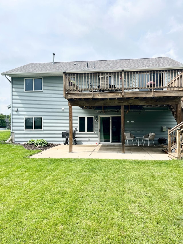 816 3rd St S, Sartell, MN 56377 - rear view of house with a deck, a patio area, a lawn, roof with shingles, and stairway