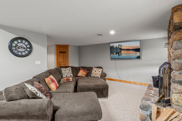 carpeted living room featuring baseboards