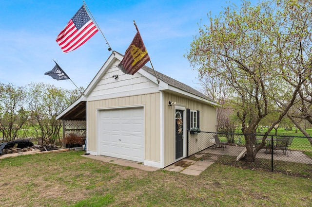 detached garage with fence