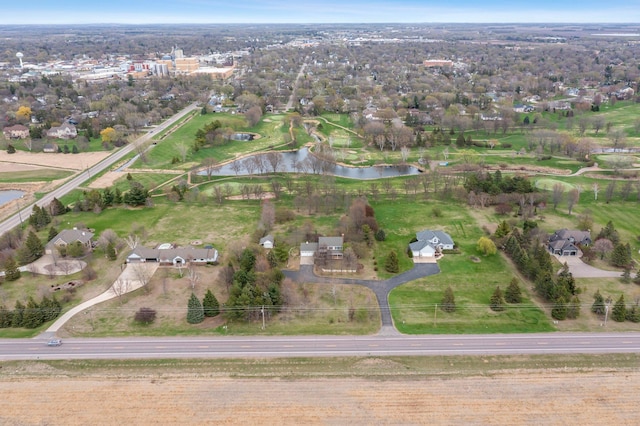 drone / aerial view with a water view