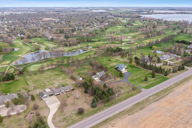 birds eye view of property featuring a residential view and a water view