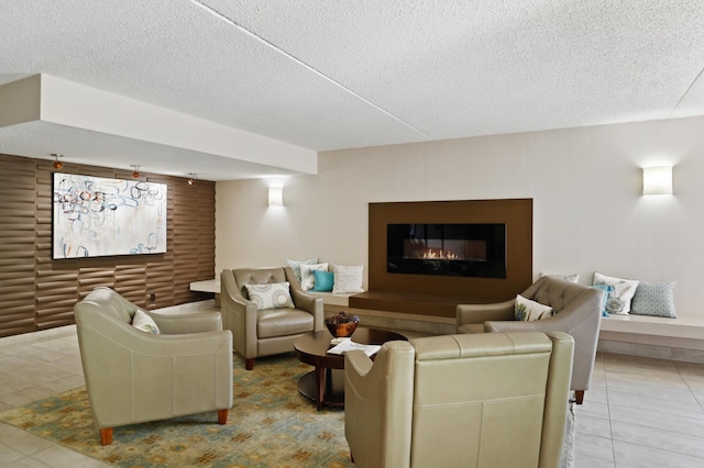7200 York Ave S Unit 304, Edina, MN 55435 - tiled living area with a textured ceiling and a glass covered fireplace