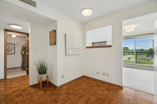 7200 York Ave S Unit 304, Edina, MN 55435 - empty room featuring water heater and baseboards