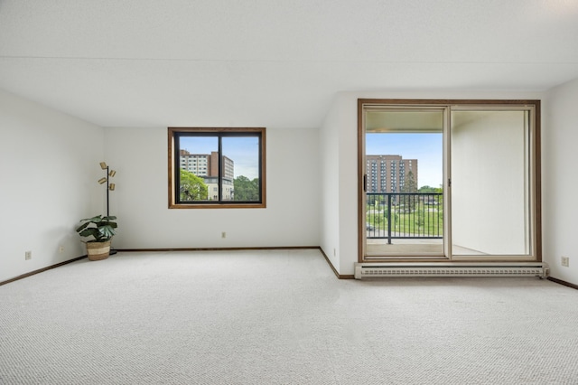 7200 York Ave S Unit 304, Edina, MN 55435 - empty room with a baseboard radiator, carpet floors, and baseboards