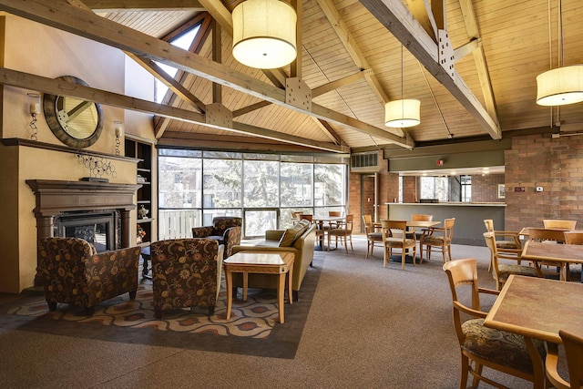 7200 York Ave S Unit 304, Edina, MN 55435 - living area featuring wooden ceiling with exposed beams, a glass covered fireplace, carpet flooring, and high vaulted ceiling