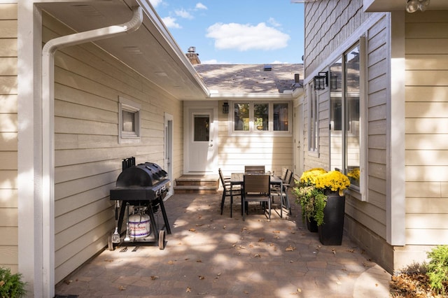 view of patio featuring area for grilling and entry steps
