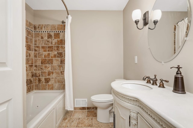 bathroom featuring visible vents, shower / bath combo, toilet, and vanity
