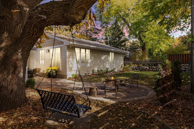 view of patio featuring fence